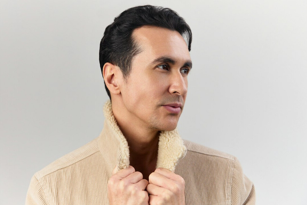 Studio portrait of a middle aged man in a jacket