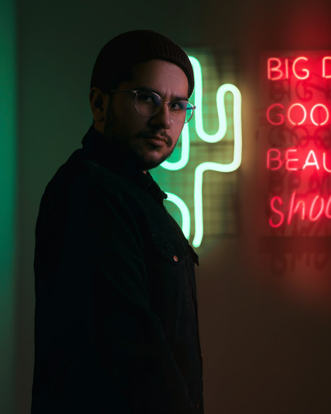 Studio portrait of a man with glasses and short beard