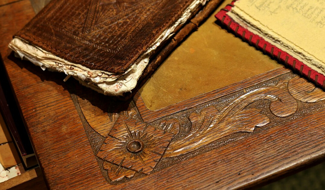 open book on wooden desk